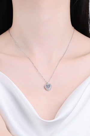 Silver heart halo moissanite pendant necklace with a delicate chain.