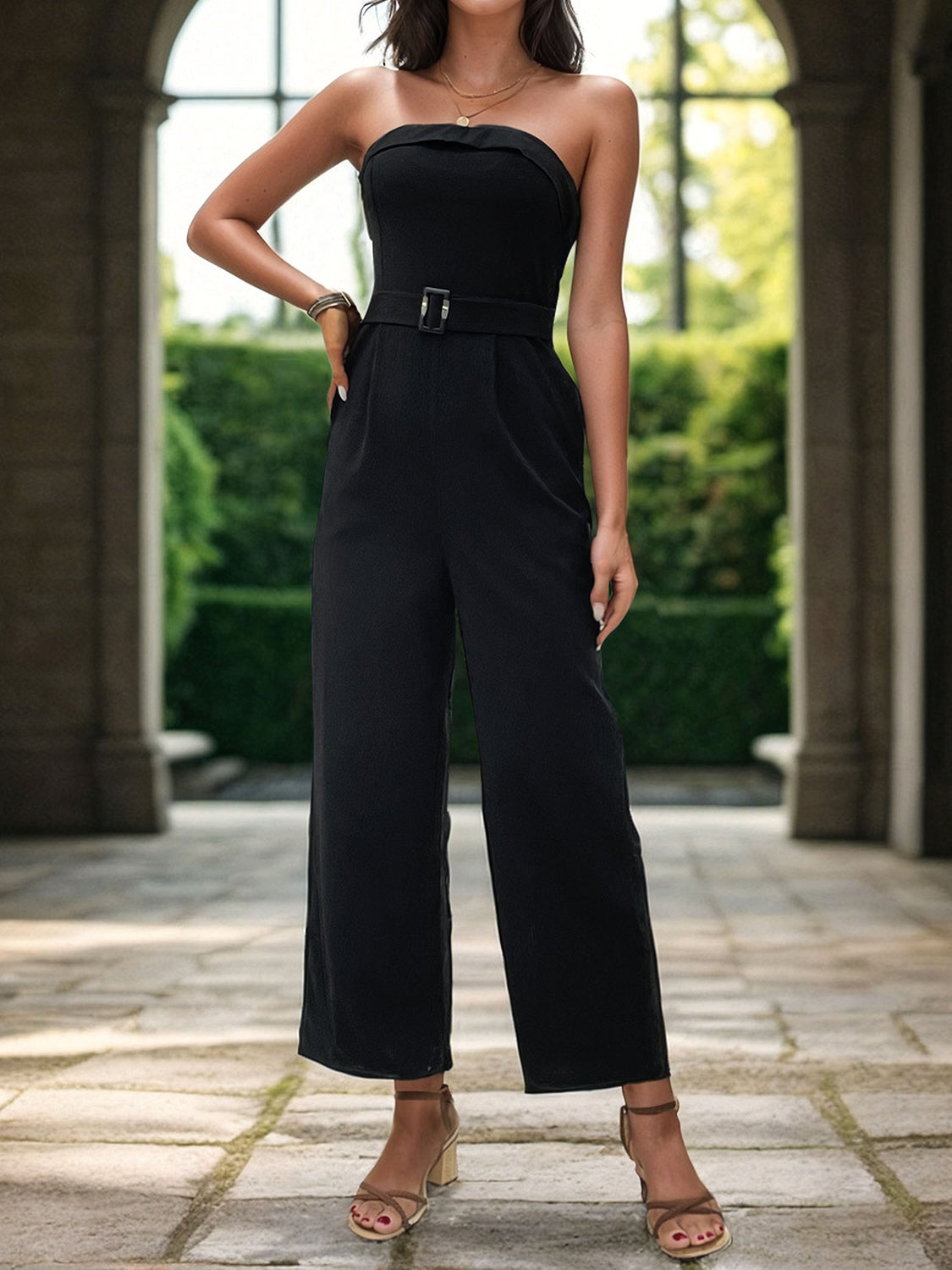 Black bandeau jumpsuit with buckle belt and wide legs