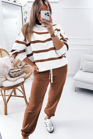 Brown striped loungewear set with crewneck sweatshirt and drawstring joggers.