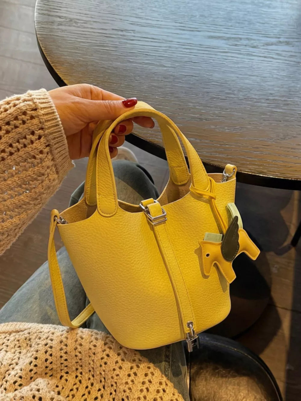 Adjustable Strap Bucket Bag in Gold, model styling view