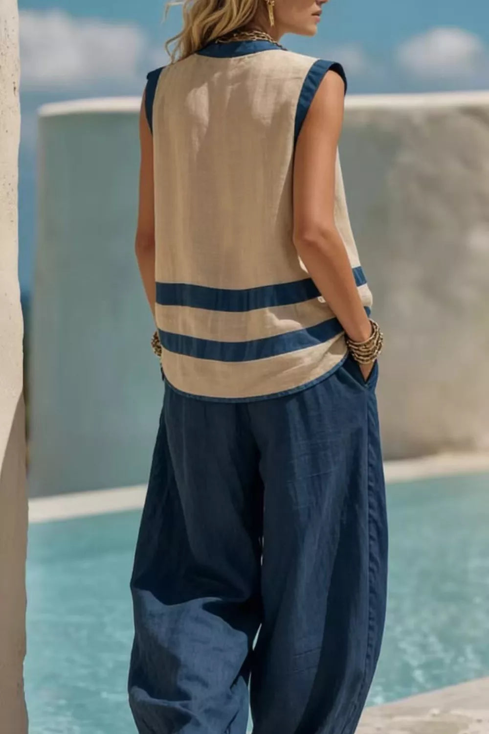 Striped linen blend sleeveless top with flowy navy pants set.
