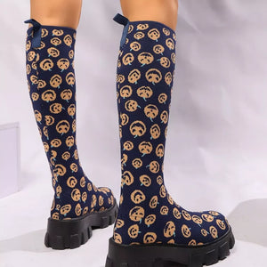 Smiley Navy Blue knee-high boots with chunky platform soles and all-over smiley face pattern.