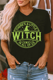 Black graphic t-shirt with "There's A Little Witch In All Of Us" text and witch hat graphic.