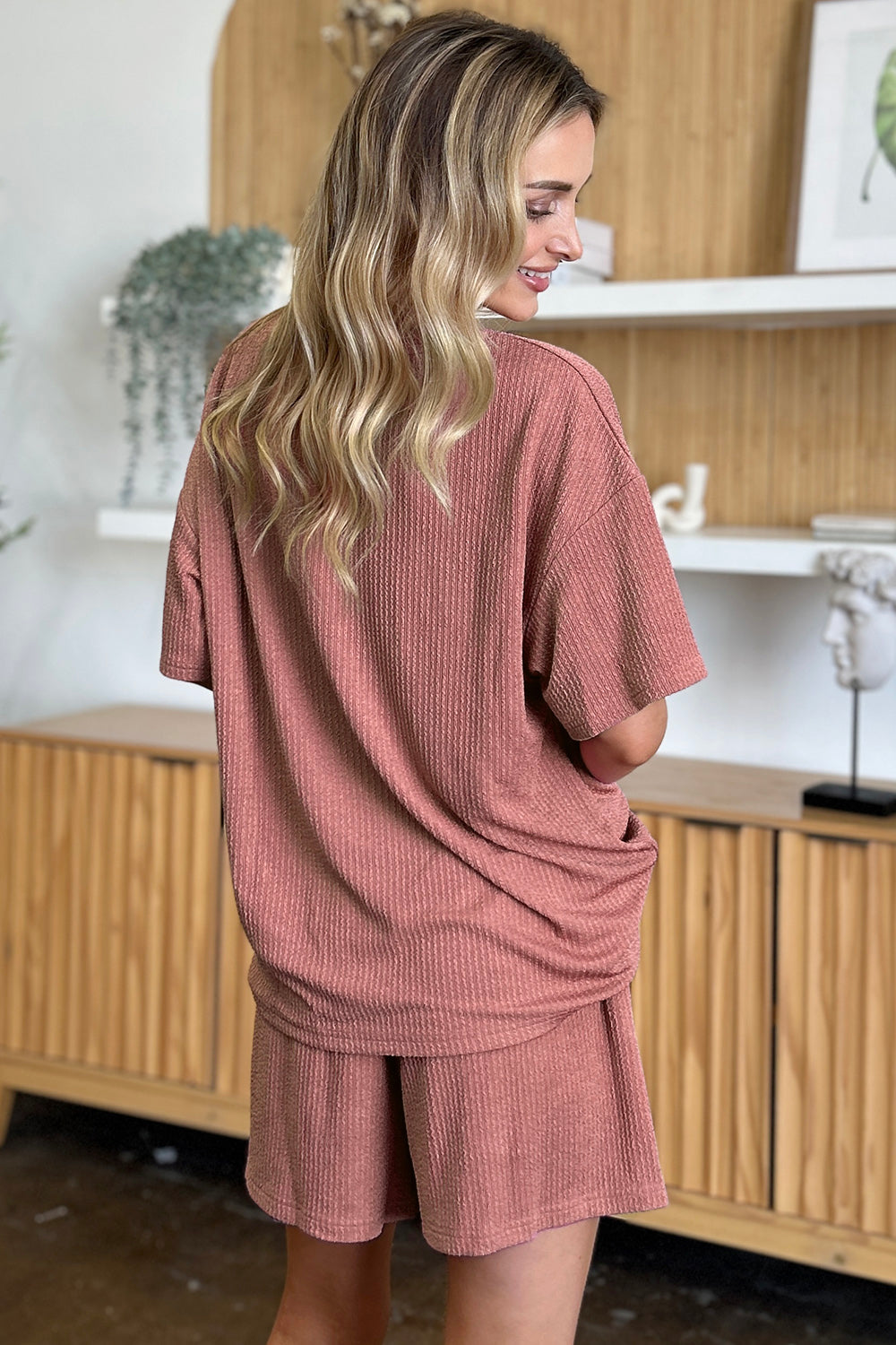 Light Mauve ribbed knit outfit set with oversized tee and shorts.