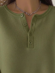 Army green long-sleeve knit top with button detail at the neckline.