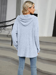 Light blue ribbed knit henley hoodie with a hood and buttons.