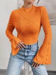 Orange lettuce edge flare sleeve t-shirt with seam detail and ruffled neckline.