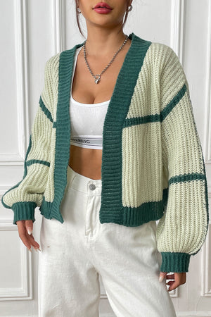 Colorblock ribbed open cardigan in cream and green with balloon sleeves and a relaxed fit.