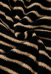Black and tan horizontal stripe slouchy knit jumper with a textured stitch.