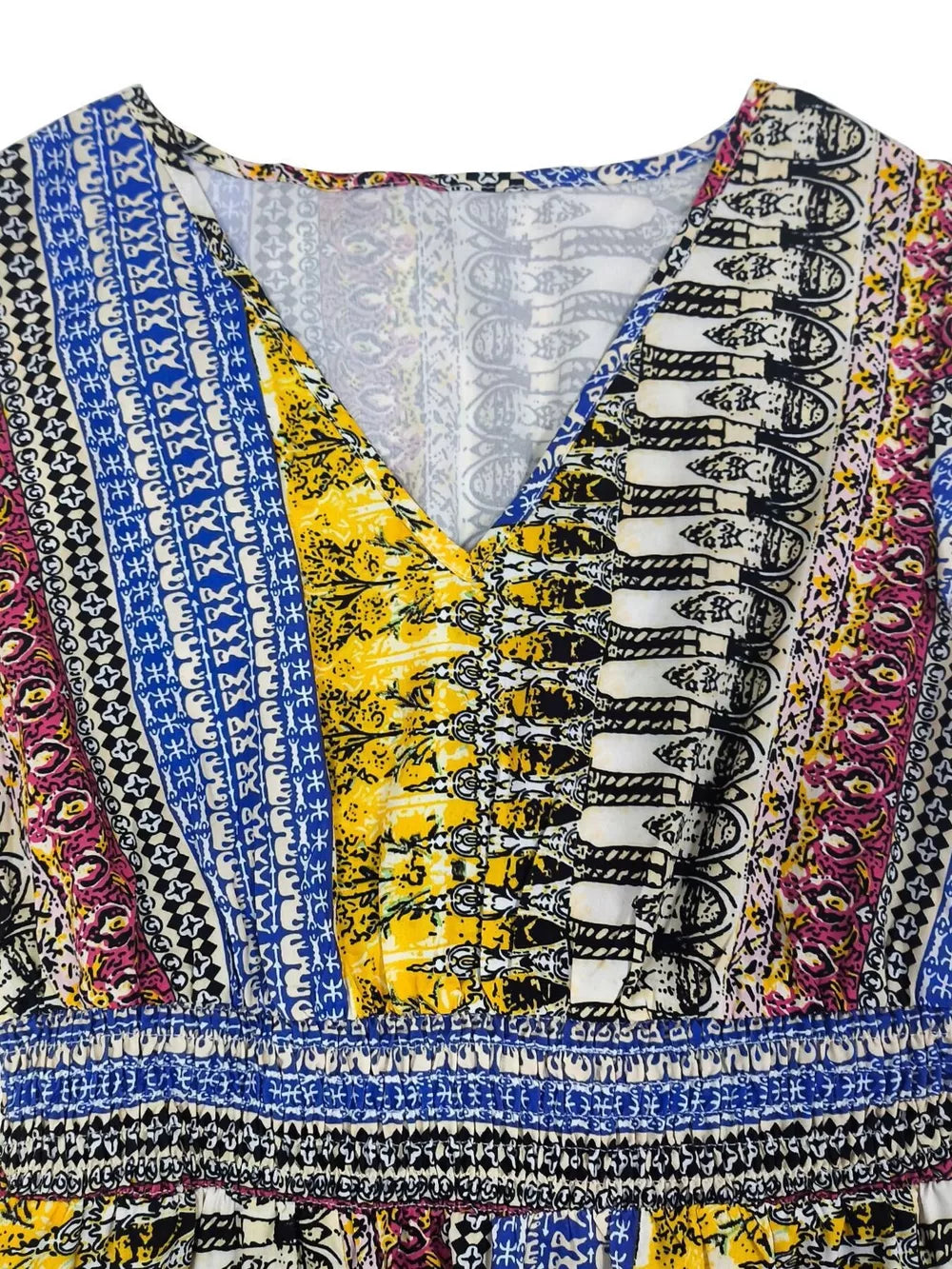 Bohemian maxi dress with V-neck, ruffle sleeves, and colorful tribal print.