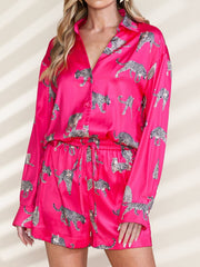 Hot Pink leopard print silk pajama set with button-up top and drawstring shorts.