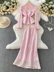 Blush pink lace peplum top and maxi skirt set with pearl trim and ruffled collar.