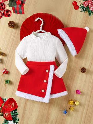 Baby red skirt and white ribbed top Christmas outfit with Santa hat.