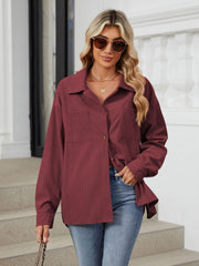 Burgundy corduroy overshirt with buttoned pockets and collar, casual long sleeve top.
