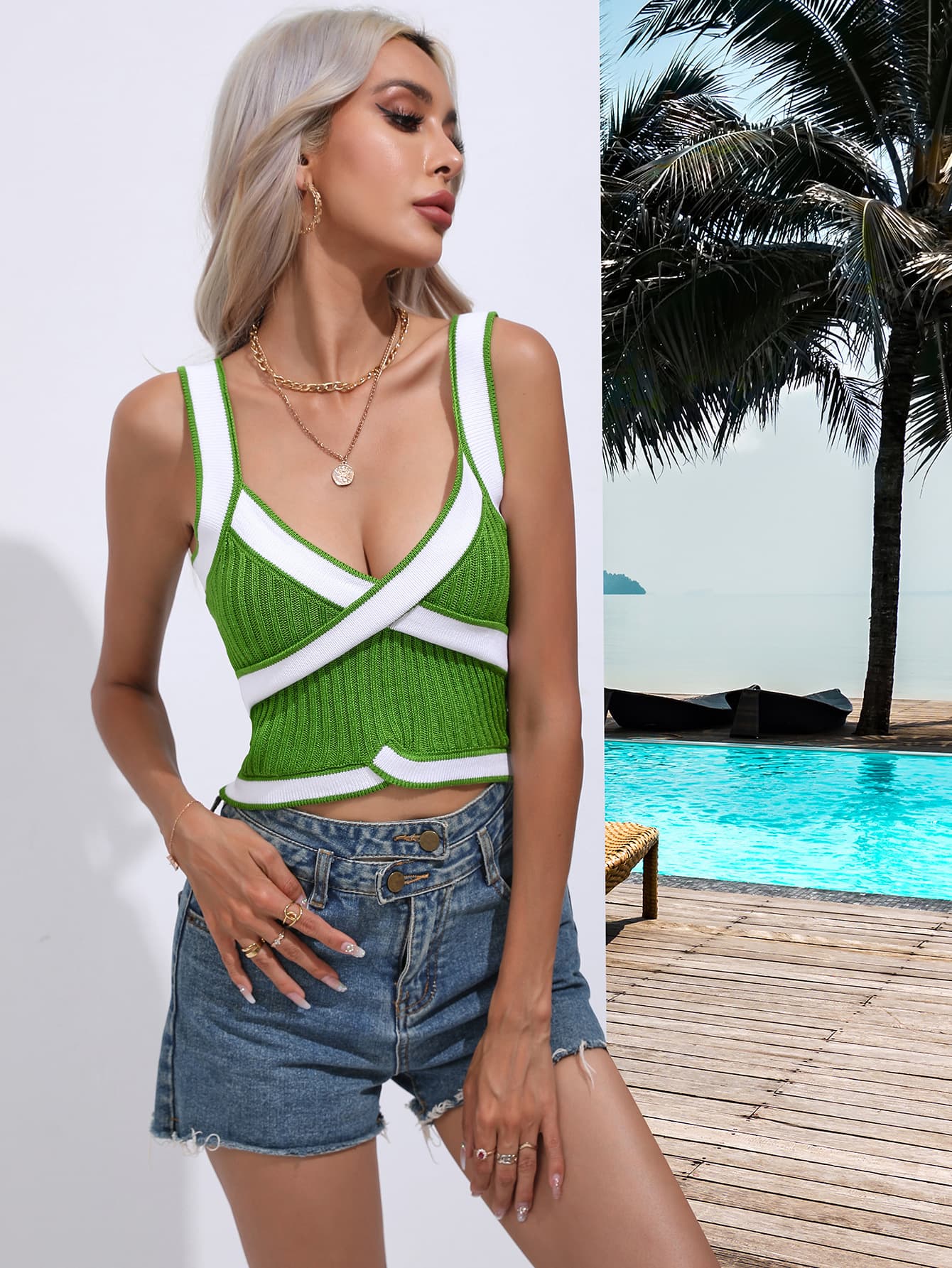 Green knit tank top with white contrast trim and crossover detail