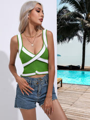 Green knit tank top with white contrast trim and crossover detail
