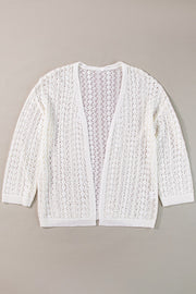 White open-knit crochet cardigan with 3/4 sleeves and a relaxed fit.