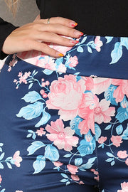 Floral Bloom Sculpt Legging in Peacock Blue with a pink and blue floral print.