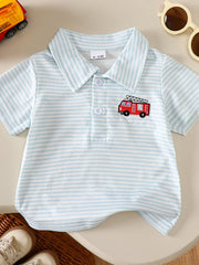Baby polo shirt in blue and white stripes with a red firetruck embroidery.