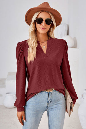 Burgundy textured blouse with bishop sleeves and V-neck