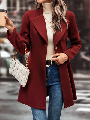 Burgundy wool blend coat with flared hemline, notched lapels, and button closure.