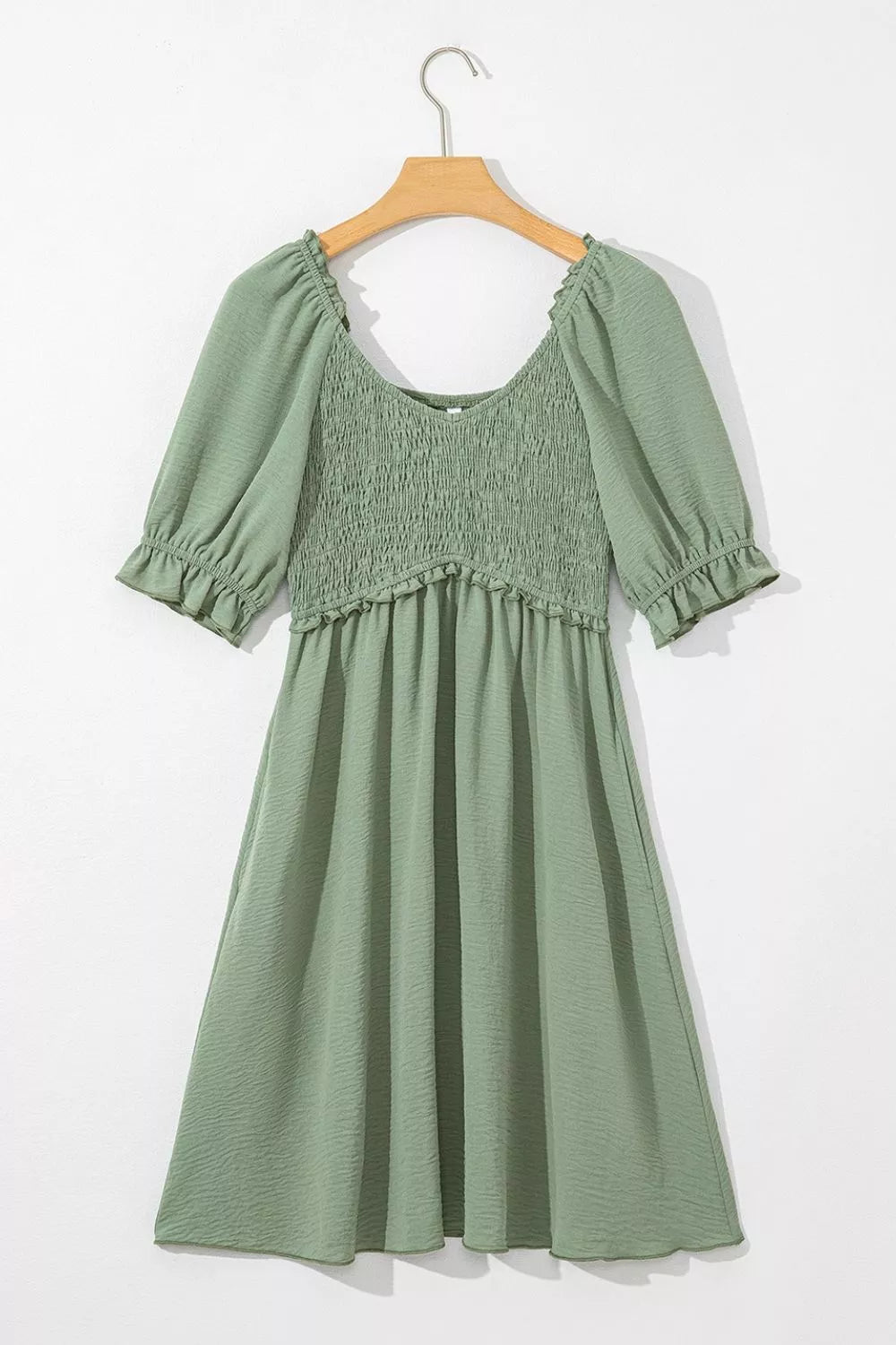 Sage V-neck smocked mini dress with frilled puff sleeves and hem