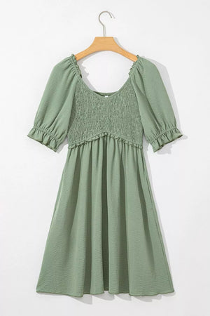 Sage V-neck smocked mini dress with frilled puff sleeves and hem
