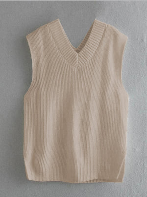 Cream textured knit v-neck sleeveless vest with asymmetric hem