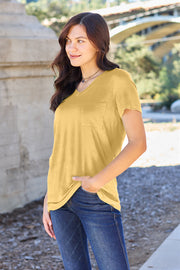 Yellow V-neck pocket tee with short sleeves and a relaxed fit.