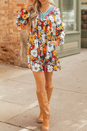 Boho Floral Print V-neck Mini Dress With Pockets in Multicolor, model styling view