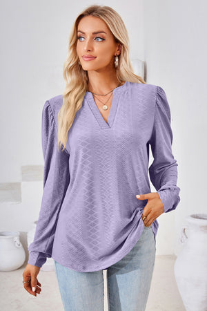 Lavender textured blouse with bishop sleeves and v-neck