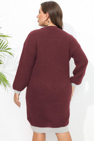 Burgundy ribbed knit dress with contrast trim at cuffs and hem.