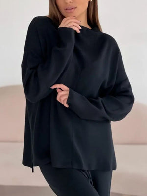 Black relaxed fit knit co-ord set with crew neck and long sleeves.