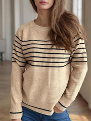 Breton stripe ribbed knit crewneck sweater in tan with black stripes, crew neck, long sleeves.