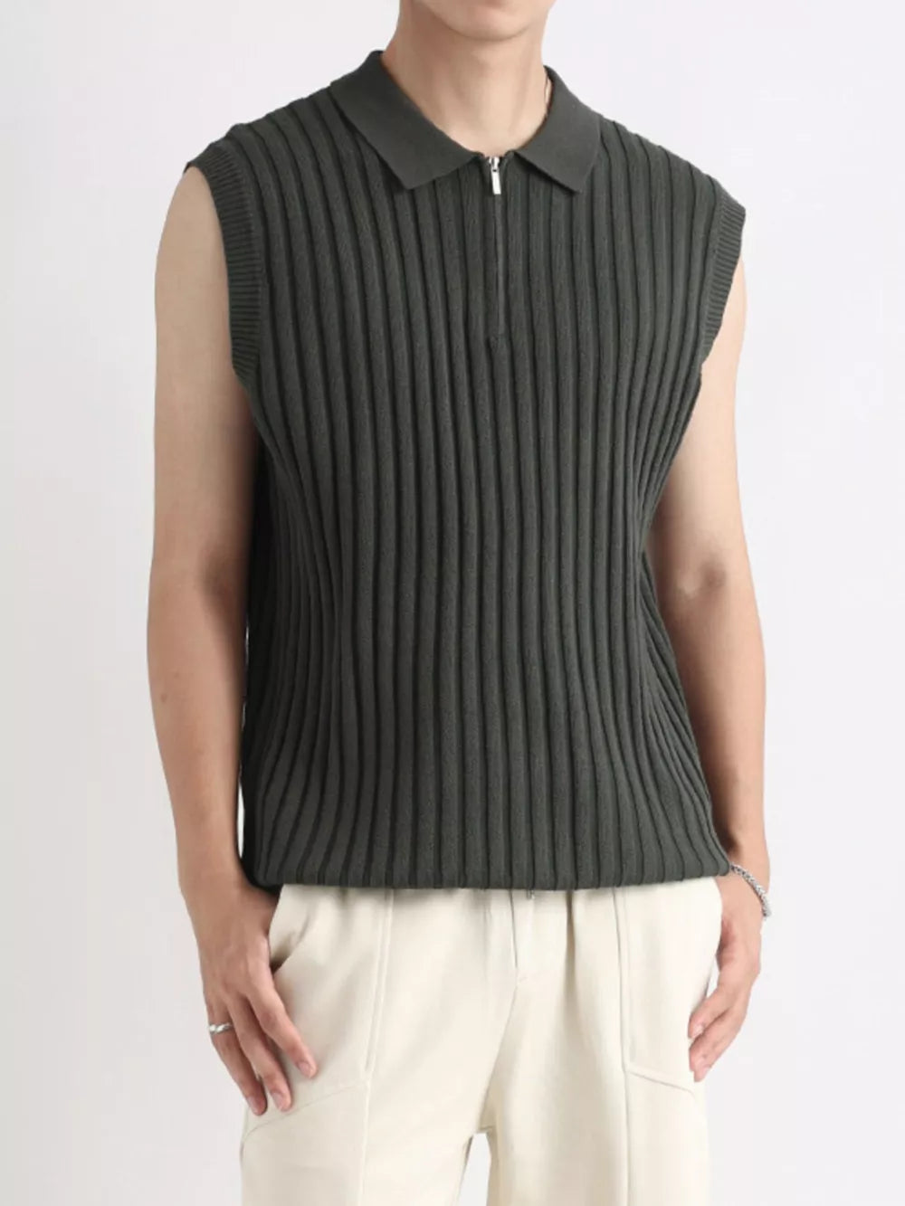 Men's ribbed knit zip-up tank in dark green with a polo collar.