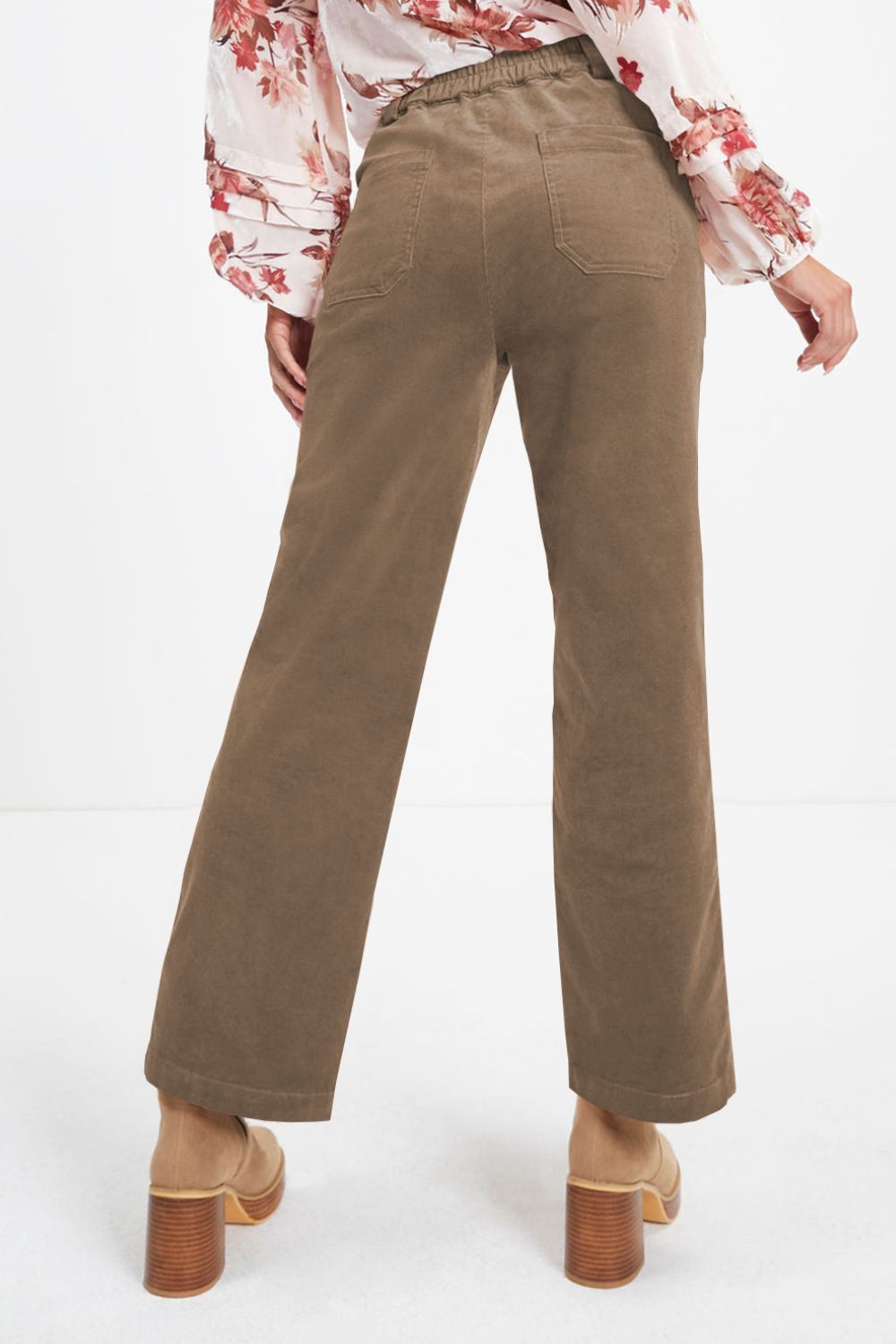 Seamed front wide leg trousers in caramel with elastic waistband and back pockets.