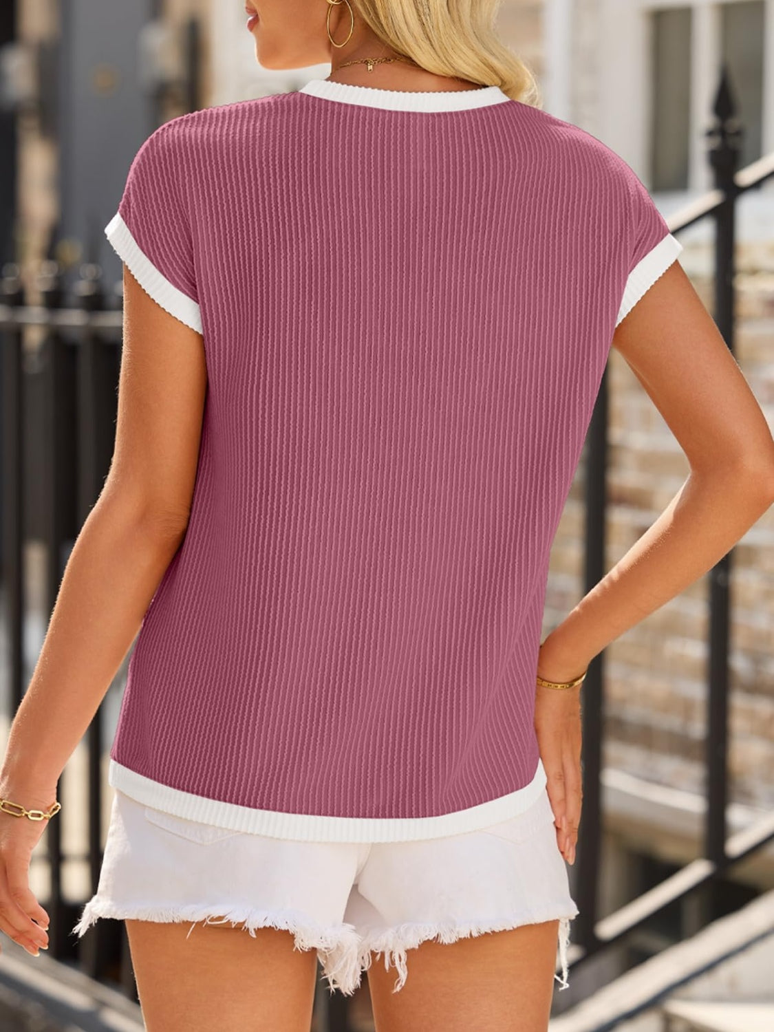 Deep Rose ribbed knit tee with white contrast piping and short sleeves.