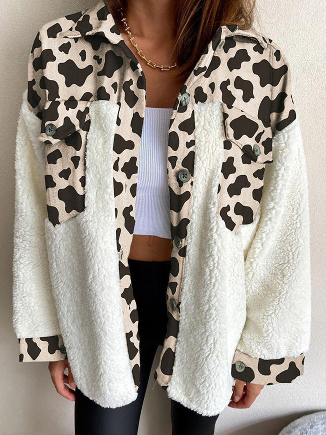 Plaid & Sherpa Hybrid Shacket in cream with cow print detail, button front, and pockets.