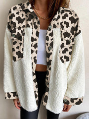 Plaid & Sherpa Hybrid Shacket in cream with cow print detail, button front, and pockets.