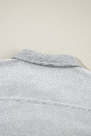 Light gray cotton utility vest with contrast collar detail