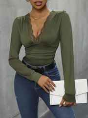 Long sleeve bodysuit in Matcha Green with lace trim V-neckline.
