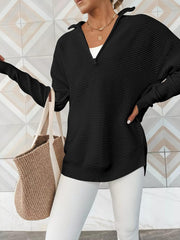 Black ribbed knit pullover with funnel neck and quarter zip, long sleeves, relaxed fit.