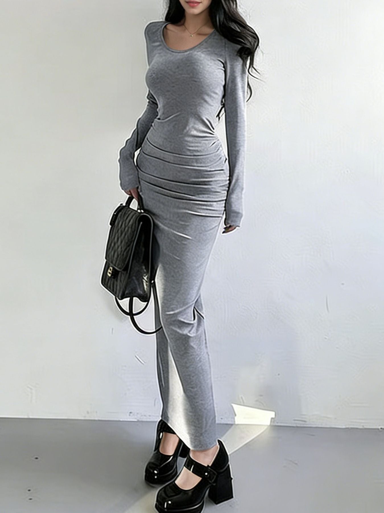 Light gray ruched long-sleeve bodycon maxi dress with a scoop neck.