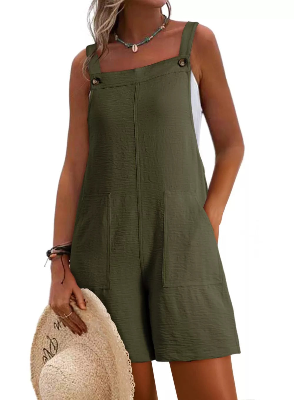 Moss green textured romper with square neckline, button straps, and patch pockets.