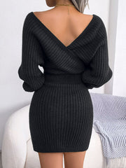 Black wrap knit bodycon mini dress with a deep V-back and long sleeves.
