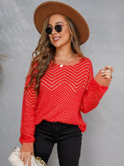 Red chevron fluffy knit sweater with contrast trim and crew neck.