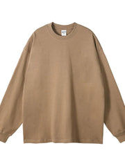 Oversized camel crewneck pullover sweatshirt, 100% cotton, with drop shoulders and long sleeves.