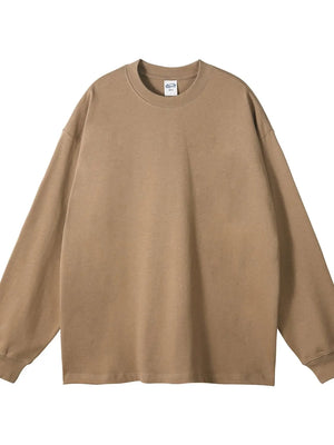 Oversized camel crewneck pullover sweatshirt, 100% cotton, with drop shoulders and long sleeves.