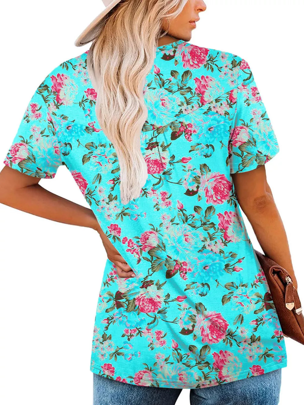 Lake blue floral ruched v-neck t-shirt with short sleeves.