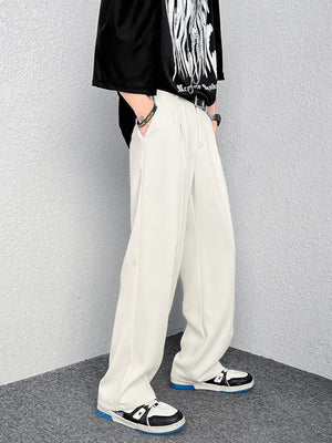 Cream wide-leg casual pants with a relaxed fit and pleated front.